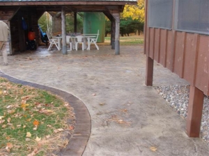 resized_Limestone Patio with Acid stained borders.JPG